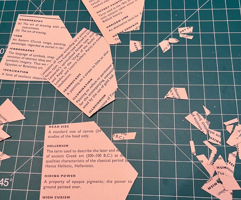 Cut up pages from the dictionary of art terms